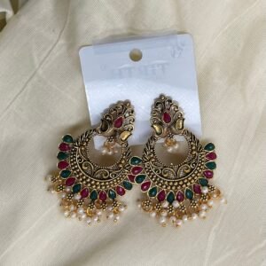 Elegant traditional ear ornament for a bold and graceful look. Perfect for weddings and festive wear.